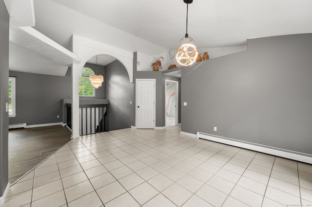 19 Peach Tree Hill Ave, Ledyard, CT 06339 - unfurnished room featuring arched walkways, a baseboard heating unit, light tile patterned flooring, and lofted ceiling