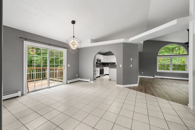 19 Peach Tree Hill Ave, Ledyard, CT 06339 - spare room featuring baseboard heating, healthy amount of natural light, and arched walkways