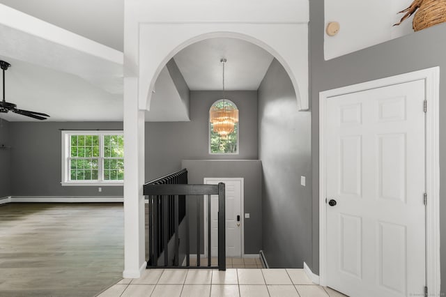 19 Peach Tree Hill Ave, Ledyard, CT 06339 - foyer entrance with a baseboard radiator, a chandelier, arched walkways, and a ceiling fan