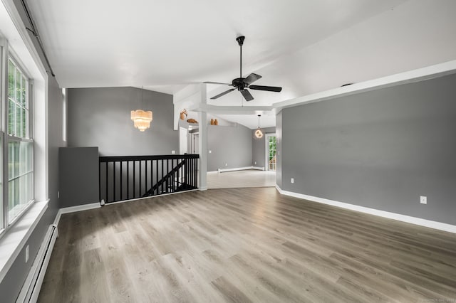 19 Peach Tree Hill Ave, Ledyard, CT 06339 - unfurnished room featuring a baseboard radiator, ceiling fan, wood finished floors, a chandelier, and vaulted ceiling