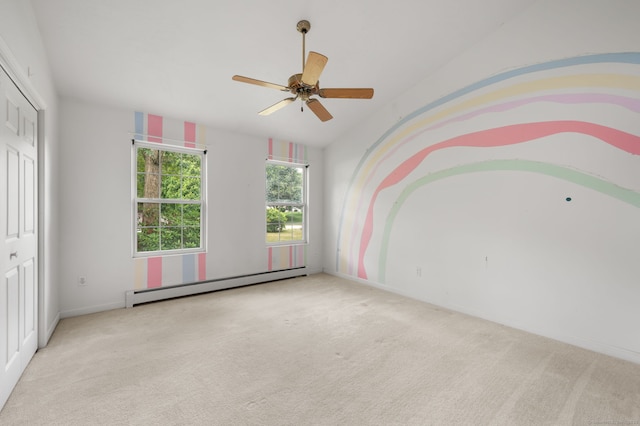 19 Peach Tree Hill Ave, Ledyard, CT 06339 - unfurnished bedroom with a baseboard heating unit, carpet floors, and a ceiling fan