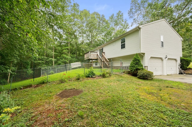 19 Peach Tree Hill Ave, Ledyard, CT 06339 - view of home's exterior featuring an attached garage, driveway, stairway, and a deck
