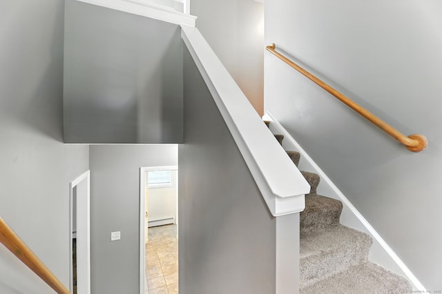 221 Griffin Rd, Suffield, CT 06093 - stairway featuring a baseboard heating unit