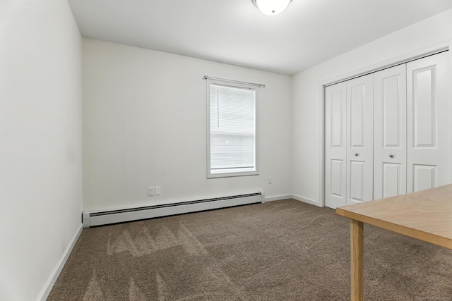 221 Griffin Rd, Suffield, CT 06093 - unfurnished bedroom featuring baseboard heating, carpet flooring, and a closet