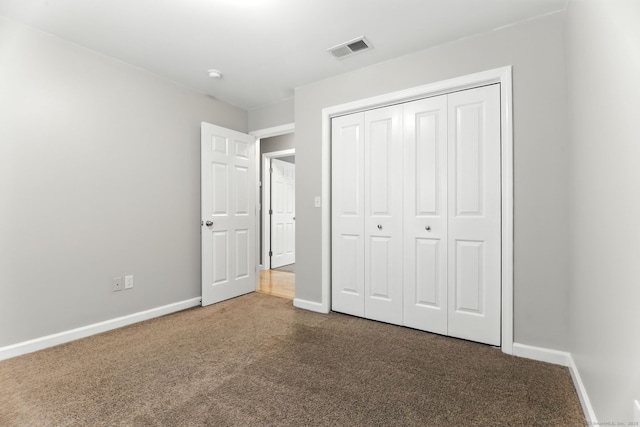 221 Griffin Rd, Suffield, CT 06093 - unfurnished bedroom with carpet floors and a closet