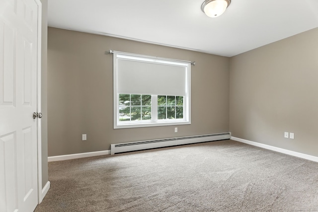 221 Griffin Rd, Suffield, CT 06093 - spare room featuring a baseboard radiator and carpet floors