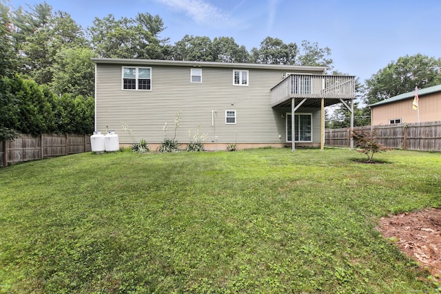 221 Griffin Rd, Suffield, CT 06093 - rear view of house with a fenced backyard