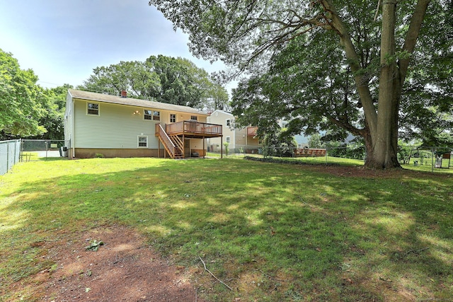 68 Highland Ave, East Haven, CT 06513 - rear view of property featuring stairway, a wooden deck, and a fenced backyard