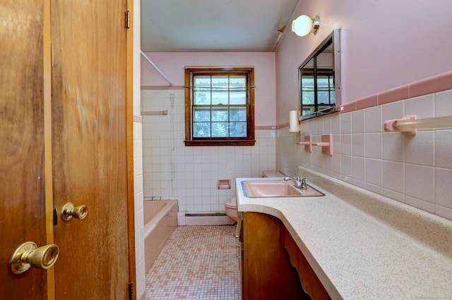 68 Highland Ave, East Haven, CT 06513 - full bathroom with vanity, a baseboard radiator, shower / tub combination, tile patterned flooring, and wainscoting