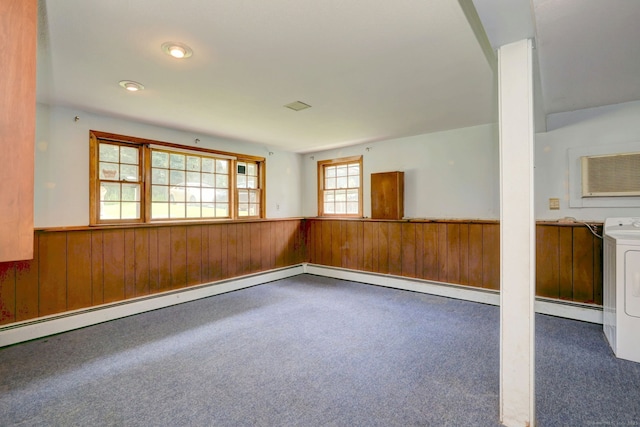 68 Highland Ave, East Haven, CT 06513 - spare room featuring washer / clothes dryer, wainscoting, wood walls, and carpet flooring