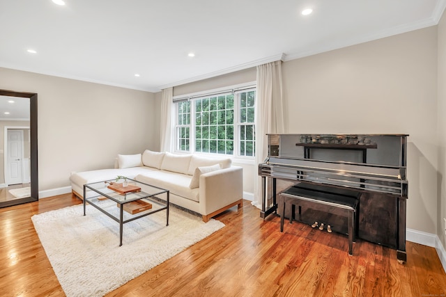 84 Edison Ave, Fairfield, CT 06825 - living room featuring ornamental molding, wood finished floors, and recessed lighting