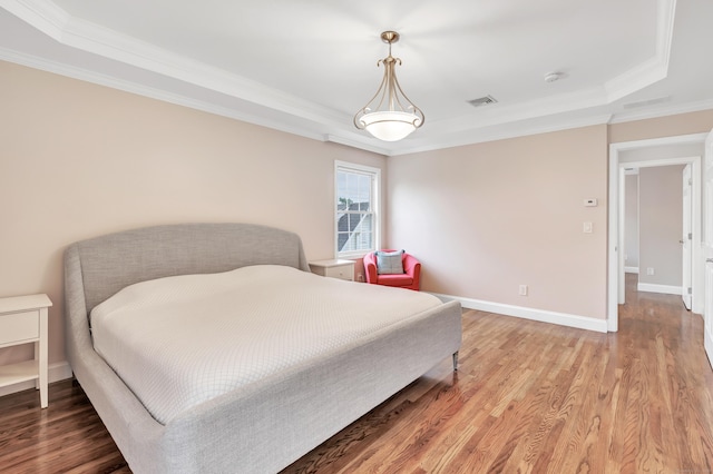 84 Edison Ave, Fairfield, CT 06825 - bedroom featuring crown molding, light wood-style floors, and a tray ceiling