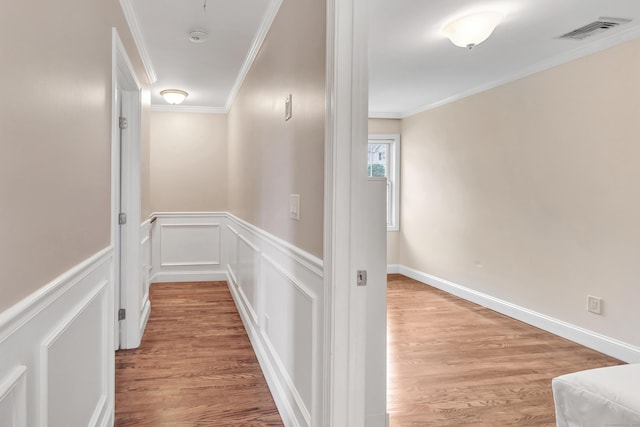 84 Edison Ave, Fairfield, CT 06825 - hallway with ornamental molding and light wood-style flooring