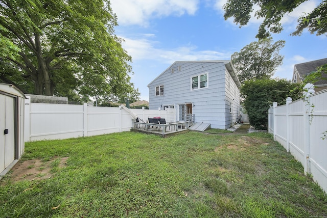 44 Pond St, Bridgeport, CT 06606 - rear view of property with a fenced backyard