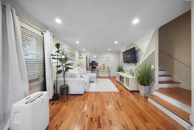 44 Pond St, Bridgeport, CT 06606 - living area with light wood-type flooring, stairway, and recessed lighting