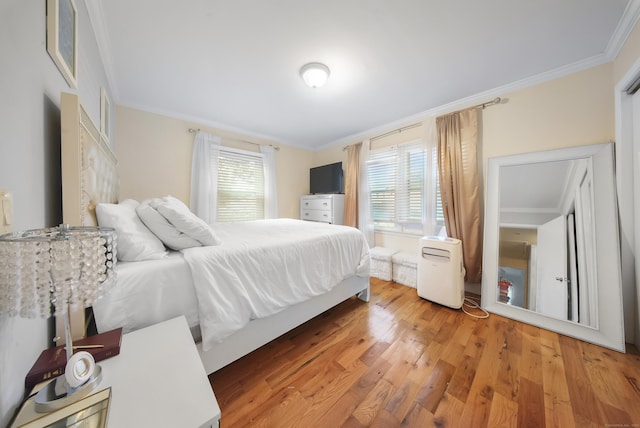 44 Pond St, Bridgeport, CT 06606 - bedroom with ornamental molding and light wood-style floors