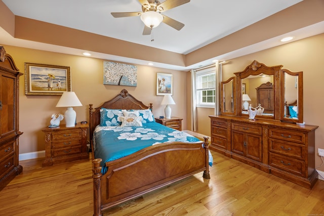 79 Orland St, Milford, CT 06460 - bedroom featuring light wood-style flooring, a tray ceiling, recessed lighting, and ceiling fan