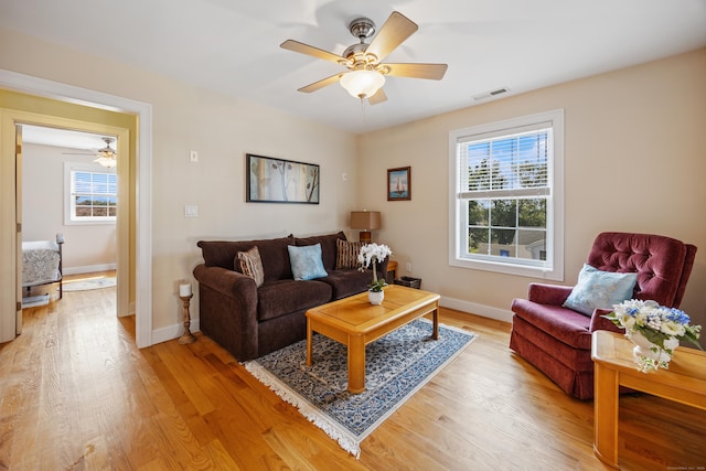 79 Orland St, Milford, CT 06460 - living room with healthy amount of natural light, a ceiling fan, and light wood finished floors