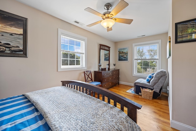 79 Orland St, Milford, CT 06460 - bedroom featuring multiple windows, wood finished floors, and a ceiling fan