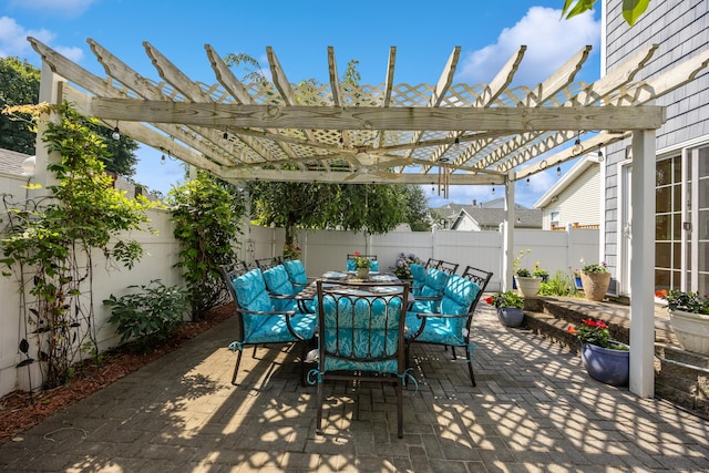 79 Orland St, Milford, CT 06460 - fenced backyard with a patio, a pergola, and outdoor dining space