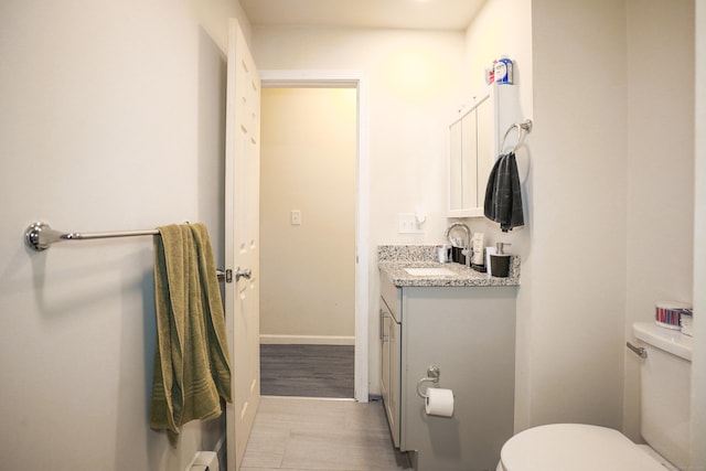 107 Dwight St, New Britain, CT 06051 - half bath with vanity and wood finished floors