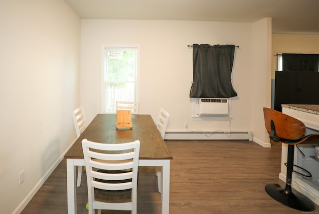 107 Dwight St, New Britain, CT 06051 - dining space featuring baseboard heating and dark wood-style flooring