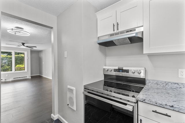 226 E Main St Apt 4, Bristol, CT 06010 - kitchen with stainless steel electric range oven, under cabinet range hood, a textured ceiling, baseboard heating, and light stone countertops