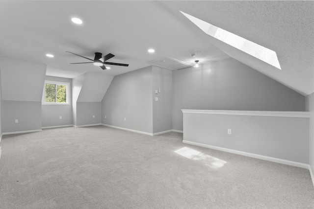 226 E Main St Apt 4, Bristol, CT 06010 - bonus room featuring a skylight, lofted ceiling, recessed lighting, carpet flooring, and a ceiling fan