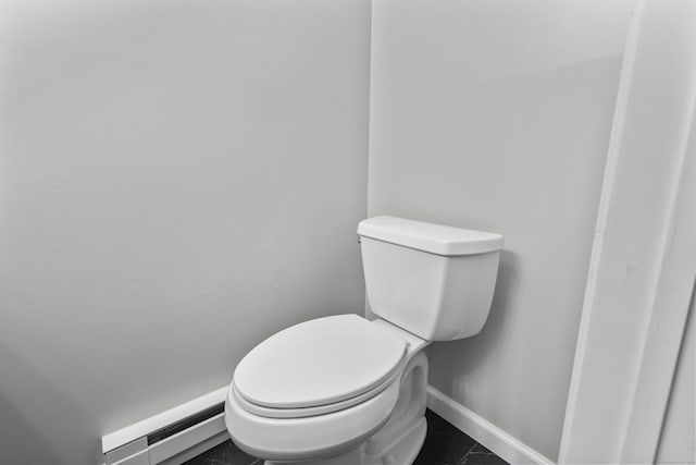 226 E Main St Apt 4, Bristol, CT 06010 - bathroom with baseboard heating and tile patterned flooring