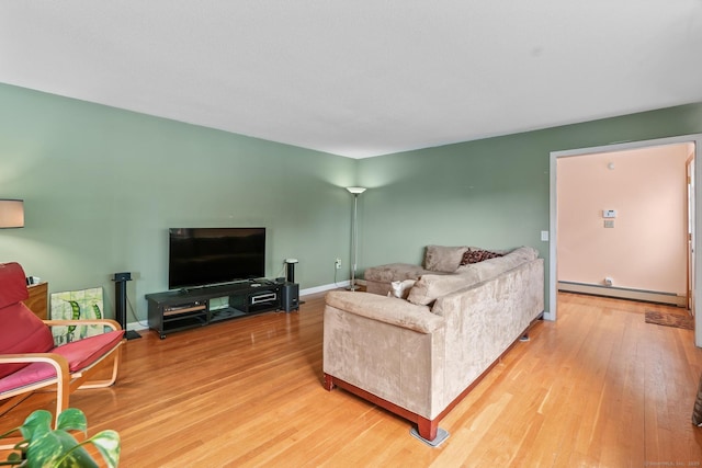 61 Mansfield Rd, New London, CT 06320 - living room with a baseboard radiator and wood finished floors