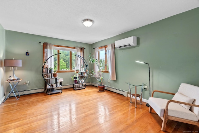 61 Mansfield Rd, New London, CT 06320 - workout room featuring an AC wall unit and wood finished floors
