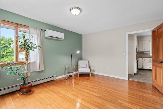 61 Mansfield Rd, New London, CT 06320 - sitting room with a wall mounted AC and light wood-style flooring