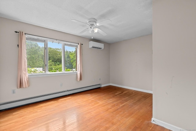 61 Mansfield Rd, New London, CT 06320 - unfurnished room featuring an AC wall unit, a baseboard radiator, light wood-style flooring, a ceiling fan, and a textured ceiling