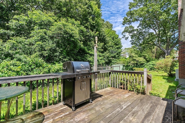 61 Mansfield Rd, New London, CT 06320 - deck with a storage shed and a grill