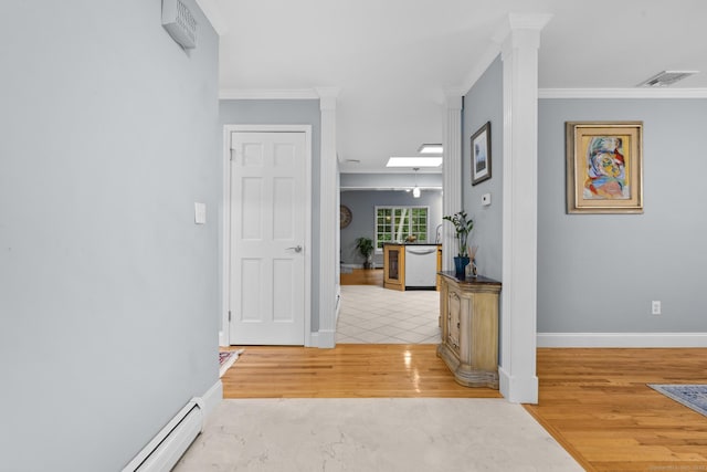 477 Skyline Dr, Orange, CT 06477 - hall with light wood-style floors, crown molding, ornate columns, and a baseboard heating unit