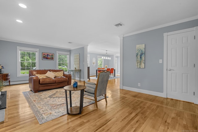 477 Skyline Dr, Orange, CT 06477 - living area featuring ornamental molding, light wood-style floors, baseboard heating, a chandelier, and recessed lighting