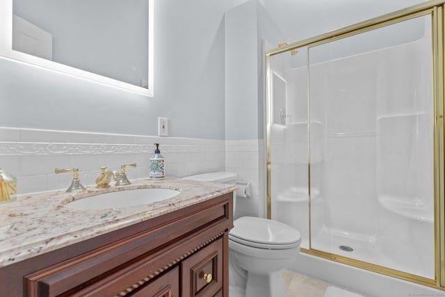 477 Skyline Dr, Orange, CT 06477 - full bath with a stall shower, tile walls, vanity, and wainscoting