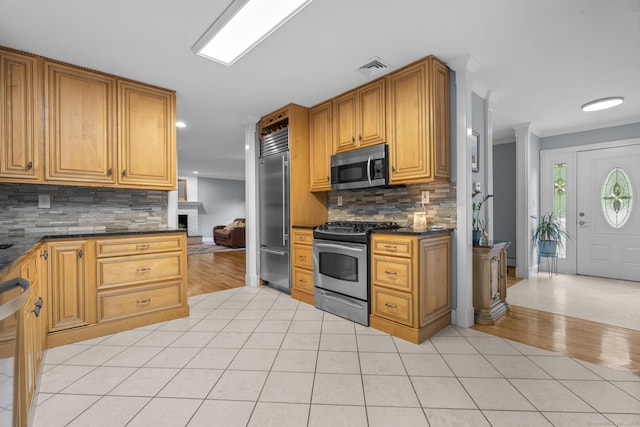 477 Skyline Dr, Orange, CT 06477 - kitchen featuring stainless steel appliances, backsplash, recessed lighting, light tile patterned floors, and ornamental molding