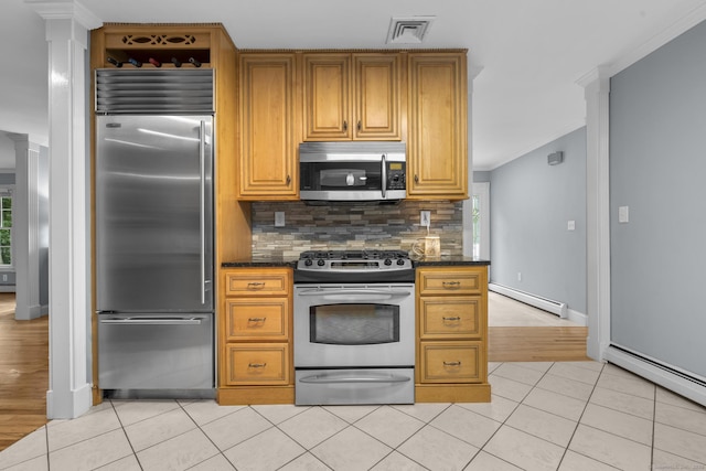 477 Skyline Dr, Orange, CT 06477 - kitchen with stainless steel appliances, a baseboard radiator, ornamental molding, decorative backsplash, and light tile patterned floors