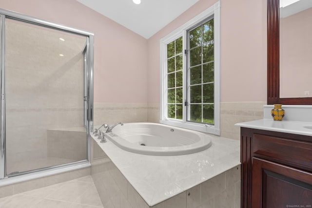 477 Skyline Dr, Orange, CT 06477 - full bathroom featuring a jetted tub, vanity, vaulted ceiling, a stall shower, and tile patterned floors