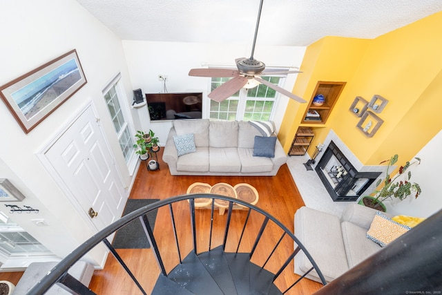 278 Carriage Crossing Ln Unit 278, Middletown, CT 06457 - living area featuring ceiling fan, wood finished floors, and a textured ceiling