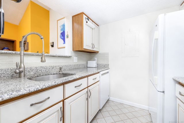 278 Carriage Crossing Ln Unit 278, Middletown, CT 06457 - kitchen featuring white appliances, electric panel, backsplash, light tile patterned floors, and white cabinetry
