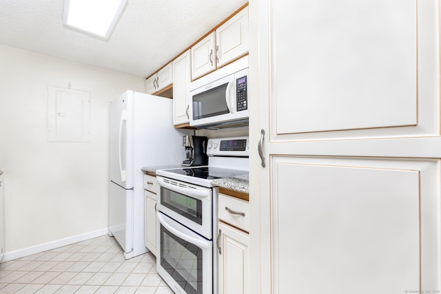 278 Carriage Crossing Ln Unit 278, Middletown, CT 06457 - kitchen with white appliances, electric panel, light countertops, light tile patterned floors, and a textured ceiling