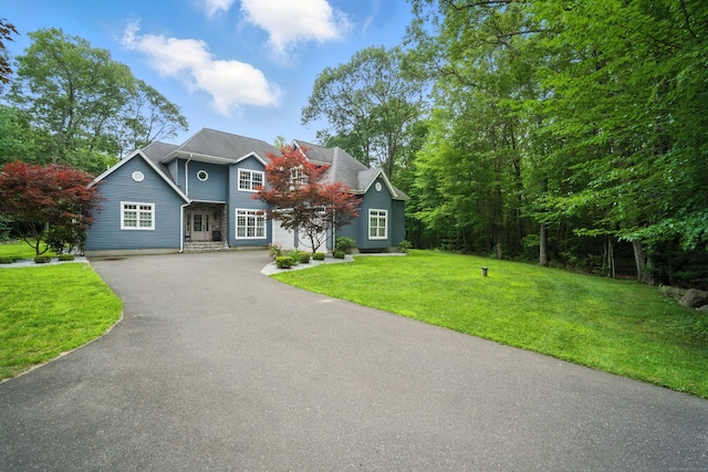 31 Galbraith Rd, Stafford, CT 06071 - view of front of property featuring asphalt driveway and a front lawn