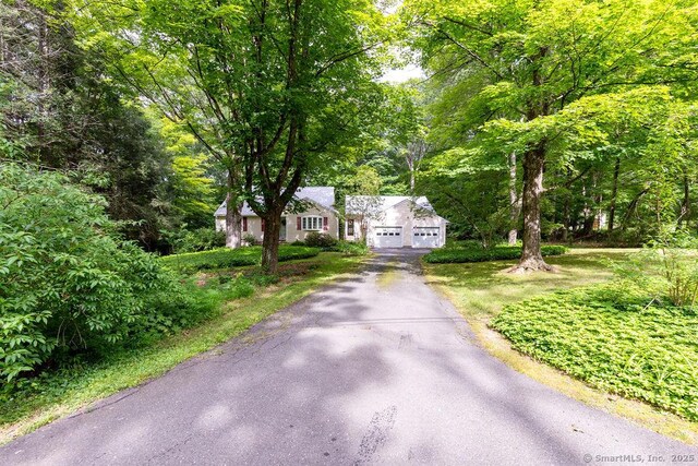 169 Wheeling Rd, Andover, CT 06232 - view of front of home featuring asphalt driveway and an attached garage