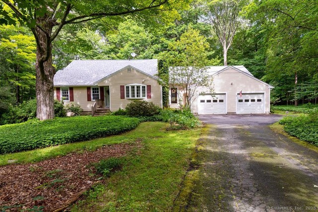 169 Wheeling Rd, Andover, CT 06232 - ranch-style home with asphalt driveway and a garage