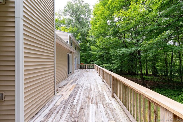169 Wheeling Rd, Andover, CT 06232 - wooden terrace featuring view of wooded area