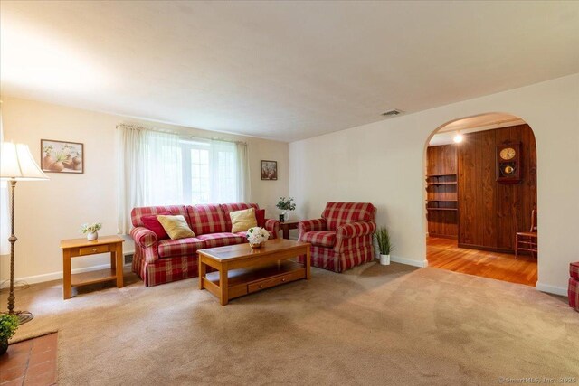 169 Wheeling Rd, Andover, CT 06232 - carpeted living area with arched walkways and baseboards
