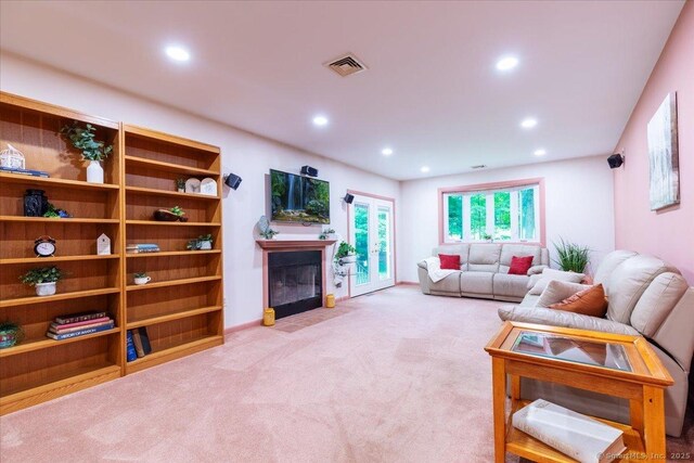 169 Wheeling Rd, Andover, CT 06232 - living area featuring light colored carpet, recessed lighting, and a fireplace with flush hearth