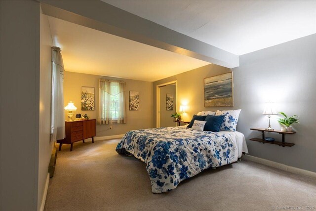 169 Wheeling Rd, Andover, CT 06232 - bedroom featuring baseboards and light carpet